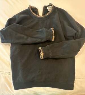S - J.Crew Black Sweatshirt with Leopard Print Ruffle Trim and Back Zipper